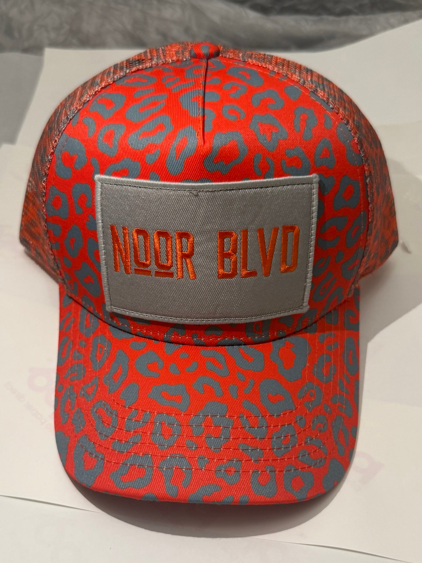 Orange Trucker Hat w/Gray Leopard prints
